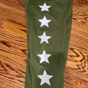 Army green sweats with white starts on the side!